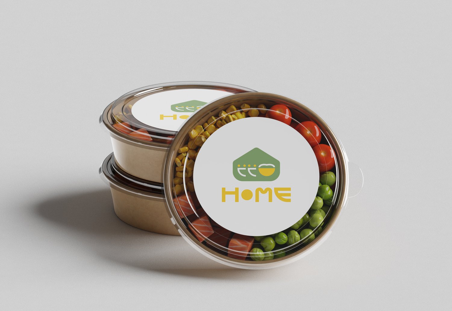 나눔 도시락 용기 목업 — 뚜껑의 흰 원 라벨에 심볼과 HOME 레터링이 위아래로 앉았습니다.